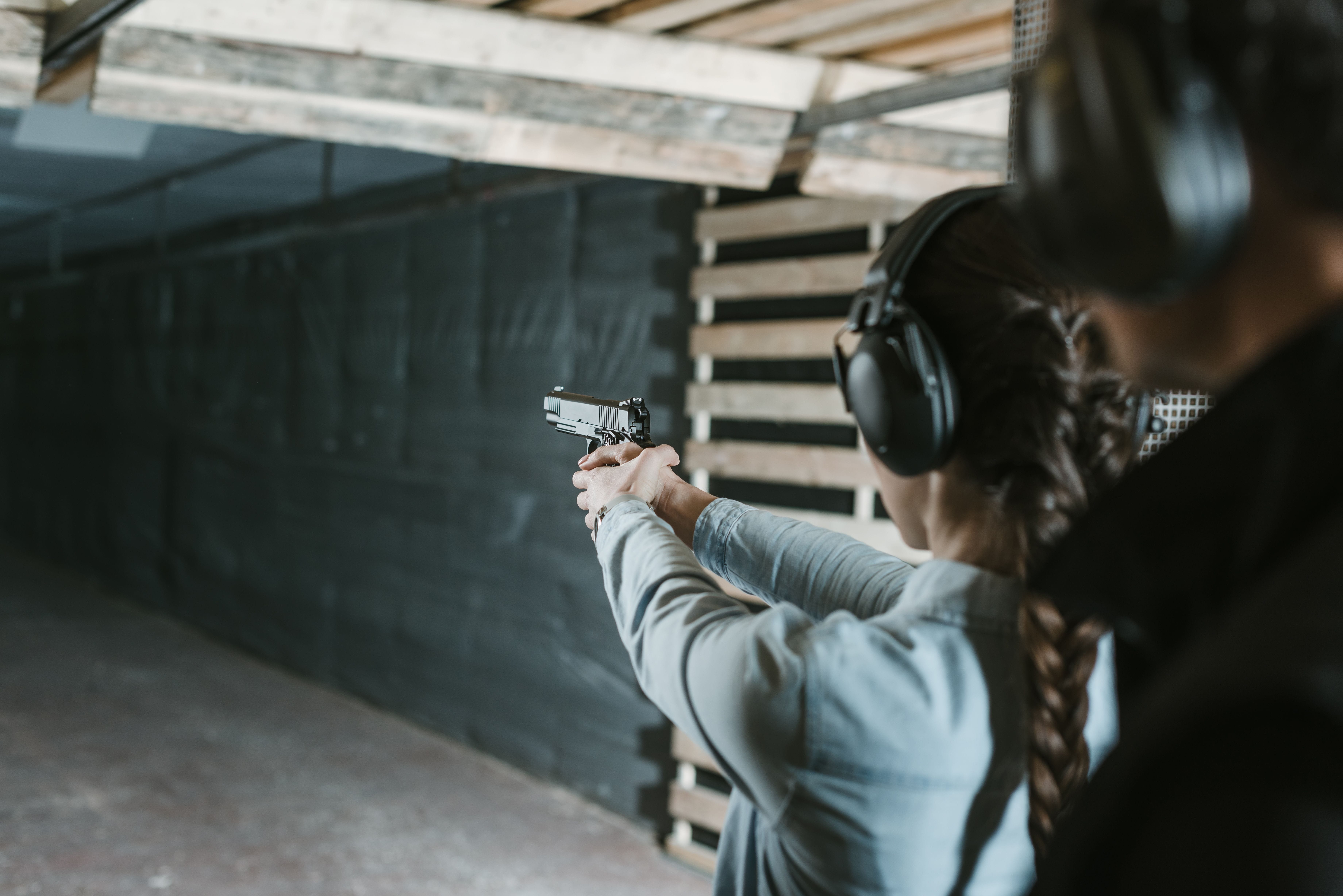 Woman At Shooting Range